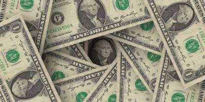 Доллар укрепляет позиции за счет высокой доходности гособлигаций США
