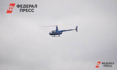 Вертолет, рухнувший в воду под Калининградом, подняли на сушу
