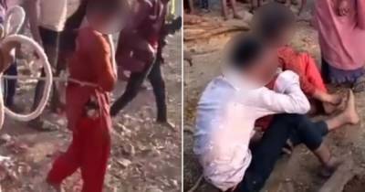 В Индии жертве изнасилования устроили "коридор позора", привязав веревкой к обидчику (видео)