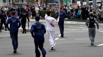 Эстафета олимпийского огня через префектуру Осака отменена