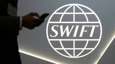 Далекая перспектива: Россия пока не намерена отказываться от системы SWIFT