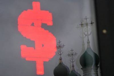 Средневзвешенный курс доллара к 11.30 мск вырос до 76,98 рубля