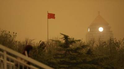 Мощная песчаная буря обрушилась на Пекин (Фото)