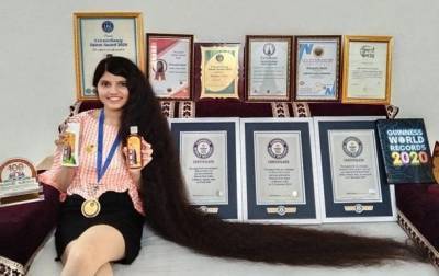 Девушка с самыми длинными волосами в мире постриглась (ВИДЕО) и мира