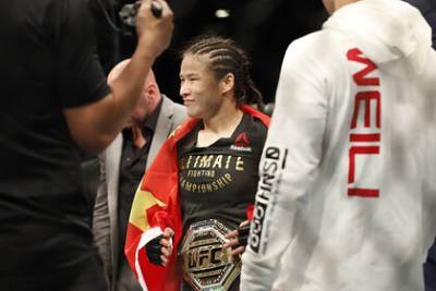 В команде чемпионки UFC из Китая отреагировали на слова о борьбе с «красными»