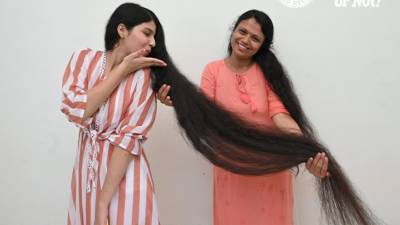 Девушка с самыми длинными волосами в мире отстригла их после 12 лет отращивания