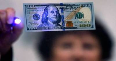 Двое жителей Нурека пытались реализовать $7,8 тыс. фальшивых долларов