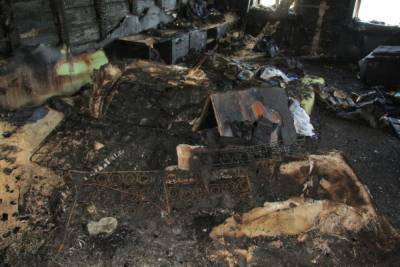 При пожаре в деревянной двухэтажке в Архангельске погибла женщина