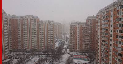 Москву накрыл снег с дождем: фото и видео
