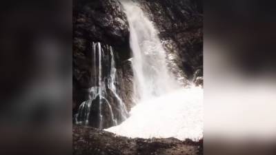 В Абхазии лавина сошла прямо в водопад