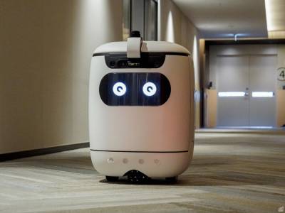 Японцы научили робота-курьера самостоятельно ездить лифтом: фото, видео