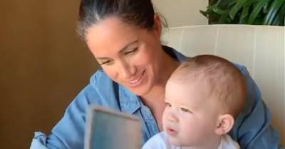 Папарацци застали беременную Меган Маркл на прогулке с сыном (видео)