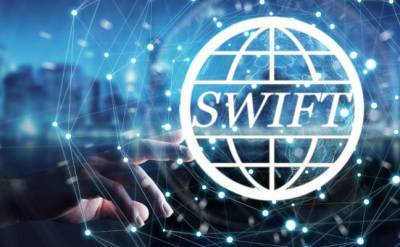 Экономист об отключении России от SWIFT: Вероятность меньше 50%