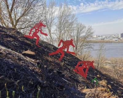 Стрит-арт «Побег» появился на склоне у Оки в Нижнем Новгороде