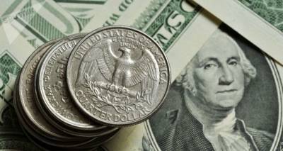 Курс доллара к мировым валютам слабо снижается