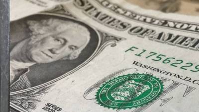Курс доллара на следующей неделе может упасть до 76,3 рубля