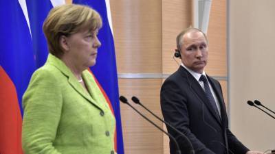 Путин обсудил Меркель ситуацию в Донбассе
