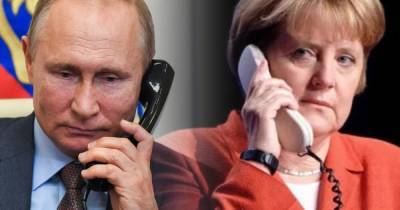 Меркель требует от Путина сократить количество войск у границ Украины