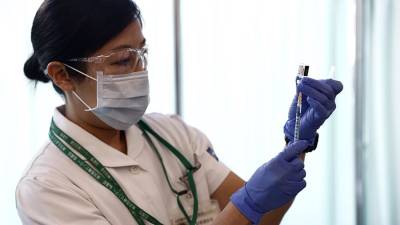 Японии выделит $700 млн на вакцины от COVID-19 для развивающихся стран