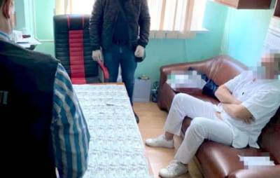 Врача задержали в больнице Одессы, фото: «требовал до 400 тыс. за операцию»