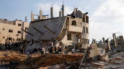 Число погибших при израильских атаках по сектору Газа достигло 83