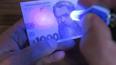Банкноты 1000 гривен подделывают с помощью струйных принтеров. В Нацбанке рассказали, как отличить фальшивые деньги