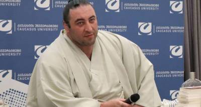 Грузинский сумоист на грани отрицательного баланса на турнире в Токио