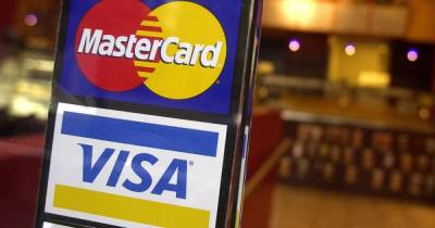 Безналичные операции станут дешевле: НБУ договорился с Visa и Mastercard о снижении межбанковских комиссий
