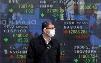 Японские акции закрылись в минусе из-за снижения аппетита к риску