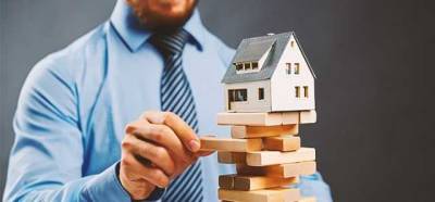 Налог на недвижимость: кто должен платить за квадратные метры