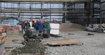 На стройку комплекса на острове Октябрьском предложили привлечь белорусских рабочих