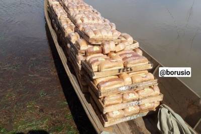 Появились снимки доставки продуктов жителям затопленных деревень в Красноярском крае