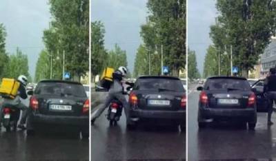 В Киеве курьер Glovo подрался с водителем посреди дороги