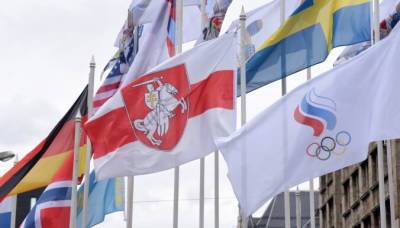 Фазель попытался защитить красно-зеленый флаг Беларуси, но получил жесткий отлуп от мэра Риги