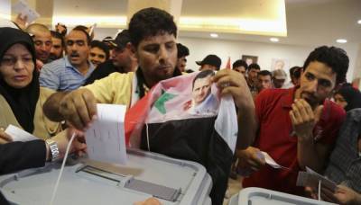 Длинные очереди на президентских выборах в Сирии