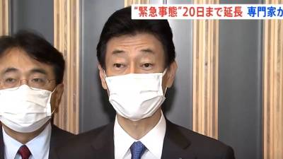 Ясутоси Нисимура - В Японии продлили режим ЧС из-за коронавируса - piter.tv - Токио - Япония