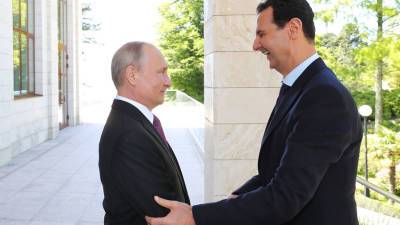 Путин поздравил Асада с победой на выборах президента Сирии