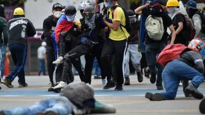 Протестующие убили полицейского, застрелившего двух человек на митинге в Колумбии