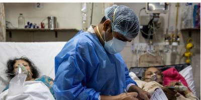 Не хватает мест. В Индии 26-летний врач решает, кто из больных коронавирусом получит шанс на жизнь — репортаж Reuters - nv.ua - Индия - Дания - Reuters