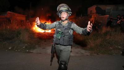 На снимавшего беспорядки оператора Ruptly напал израильский силовик