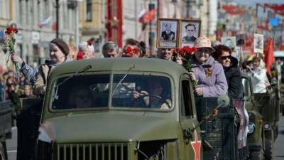 Российским водителям предложили проехать 9 мая с портретами ветеранов