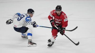 Максим Комтуа - Финляндия в серии буллитов обыграла Канаду на ЧМ-2021 - russian.rt.com - Англия - Швейцария - Финляндия - Канада