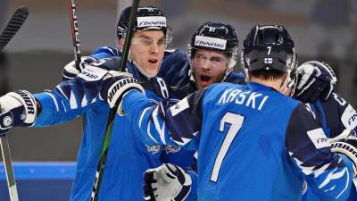 Максим Комтуа - Финские хоккеисты обыграли канадцев в серии буллитов - vesti.ru - Англия - Швейцария - Финляндия - Канада