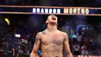 Морено досрочно победил Фигейредо и стал новым чемпионом UFC в наилегчайшем весе
