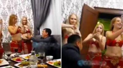 В Узбекистане чиновников застали с полуголыми блондинками