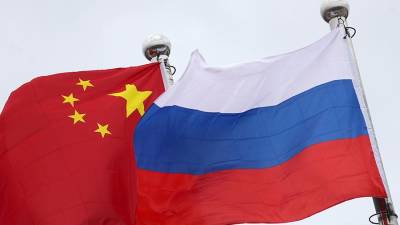 Путин указал на попытки извне разрушить связи России и Китая