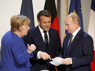 Меркель и Макрона хотят пригласить Путина на саммит ЕС