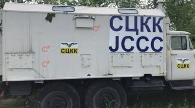 На Донбассе под обстрел боевиков попала машина СЦКК