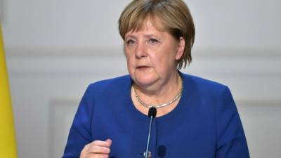 Меркель: Мы будем давить на Минск, пока ситуация не изменится