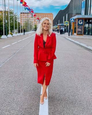 Стилист Анна Шарлай о нарядах именитых гостей на ПМЭФ: "Красный - это цвет власти"
